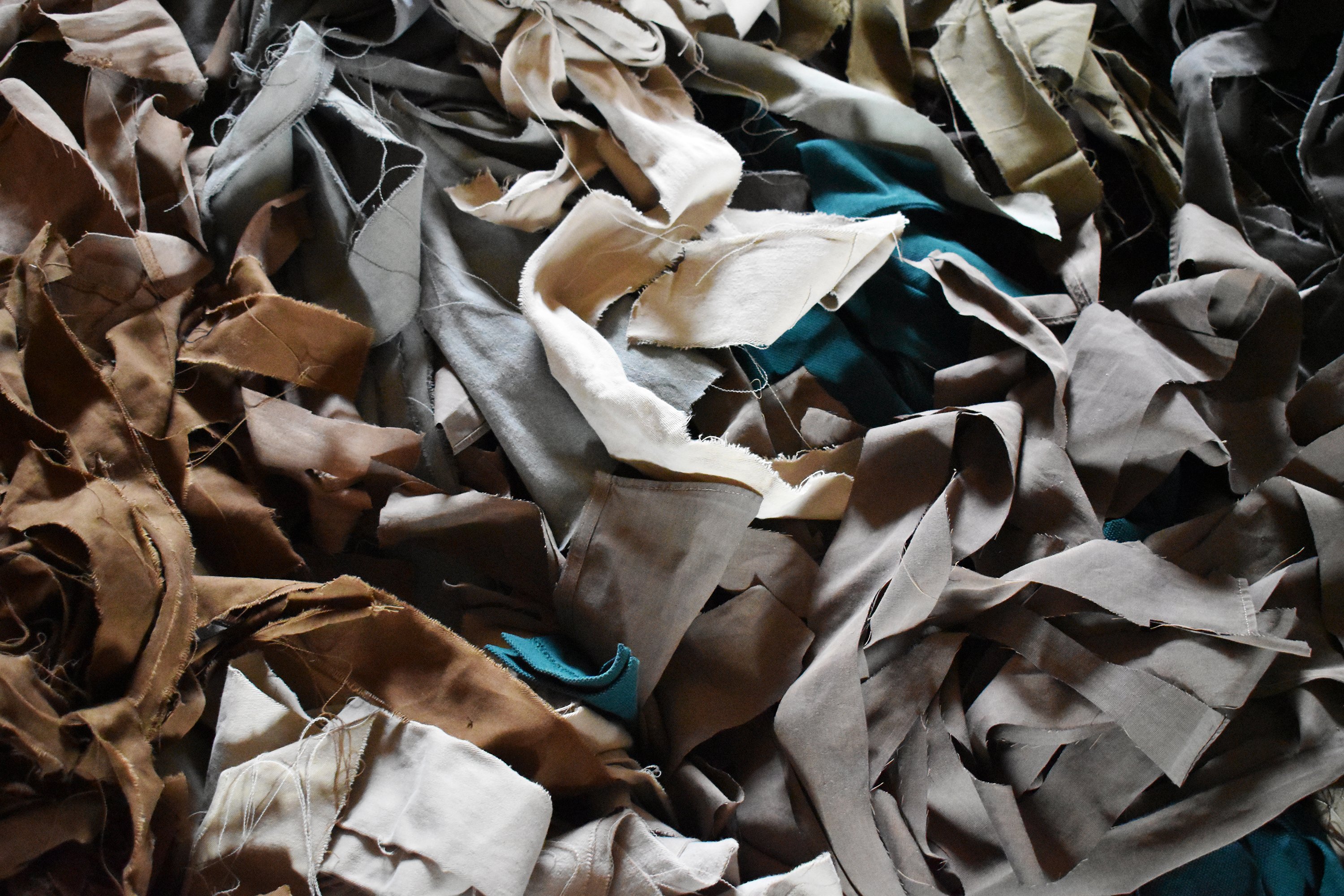A pile of mixed fabrics.